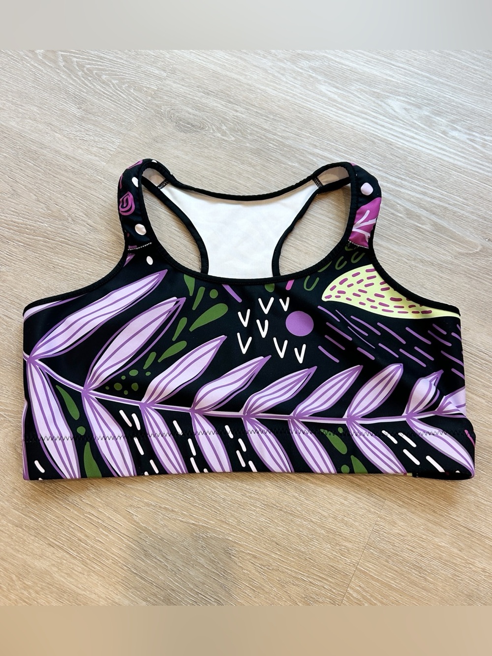 Loony Legs sports bra with purple/green leaf design size XL